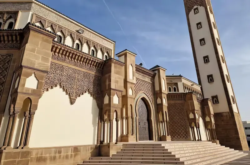 Carved facade and minaret of the Mohammed V Mosque
