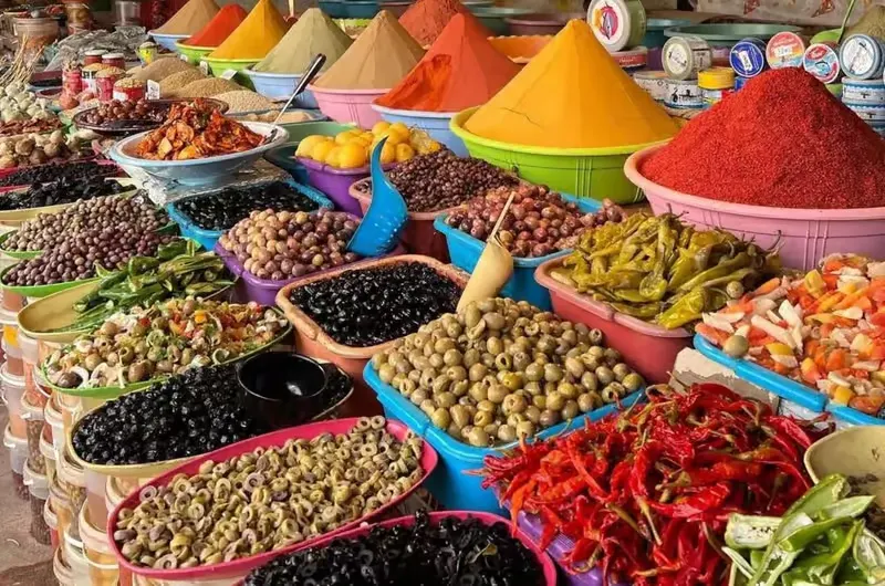 Spices and olives piled high in the souk